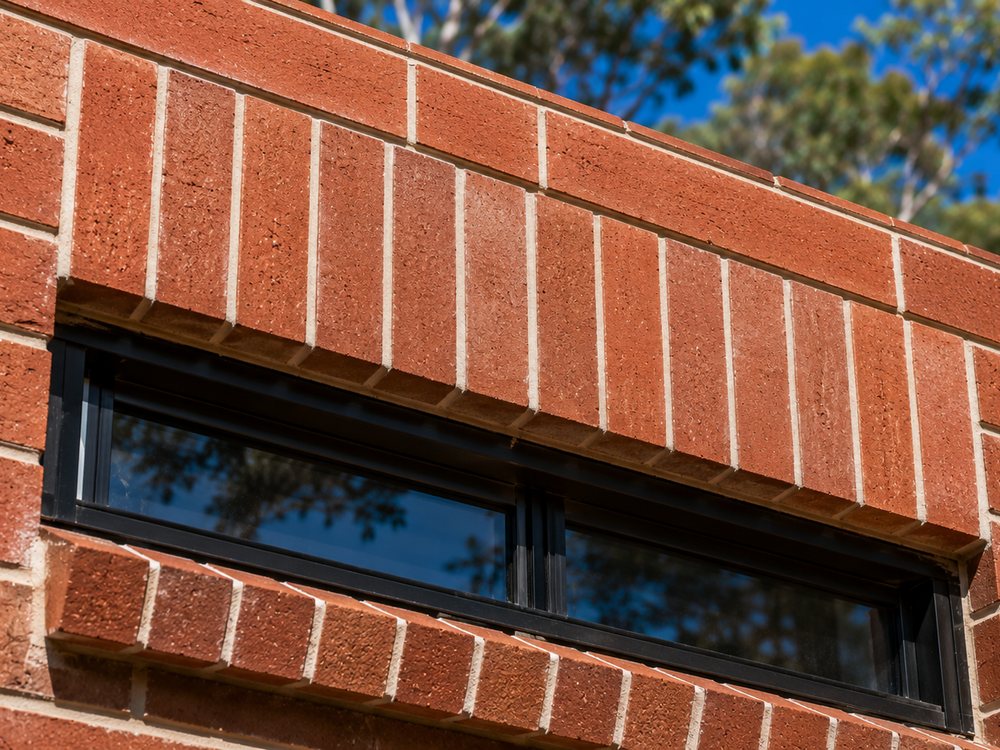 Brick detail above a window opening